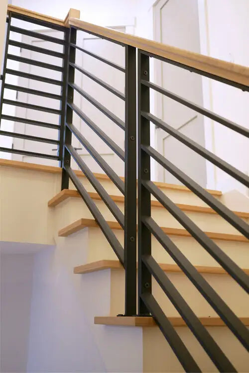 Basement Stairway Combines Wood and Metal for Appealing Transitional Look